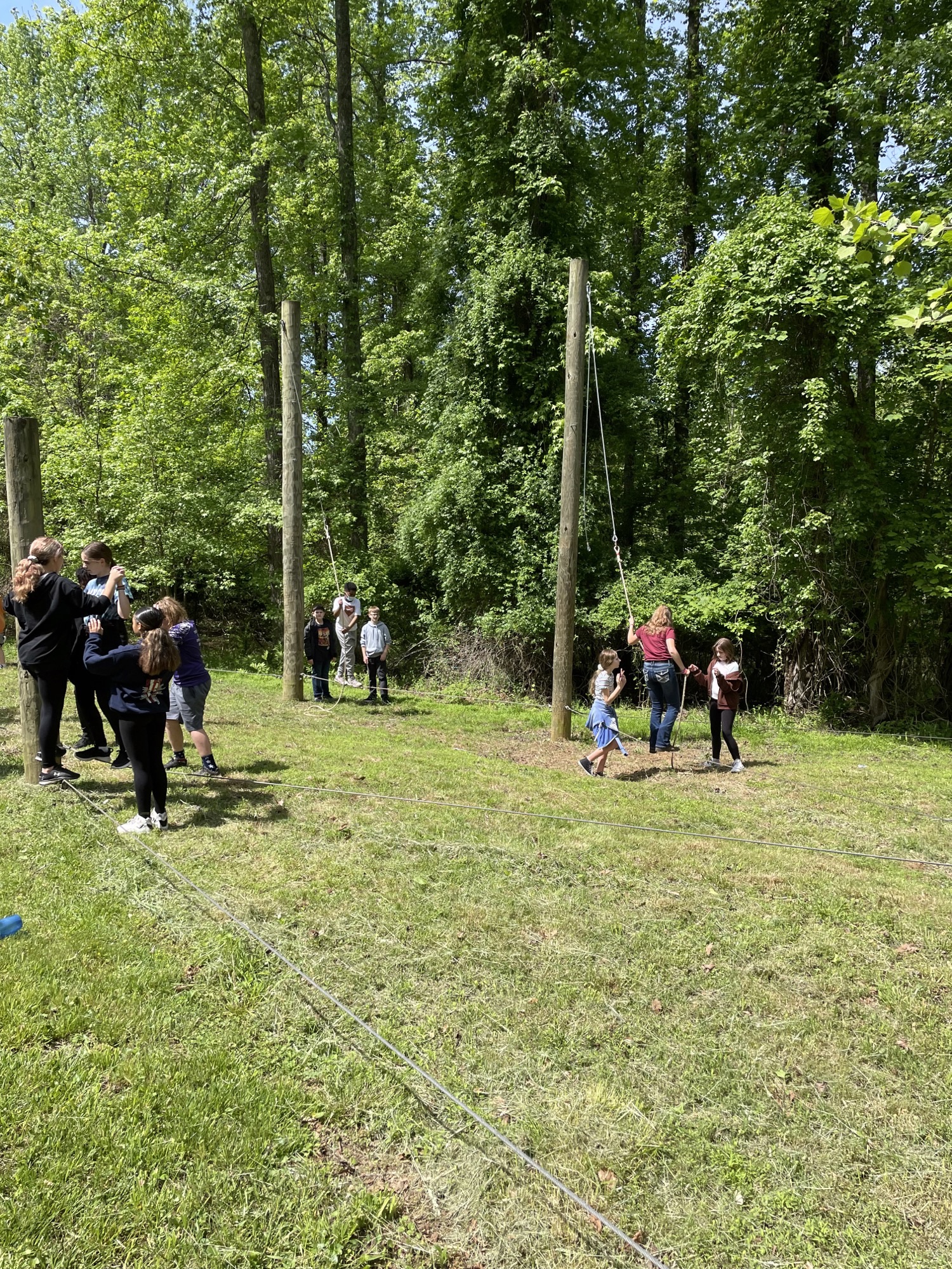 Photo of Magnolia Middle Students Work Together on Low Ropes Course